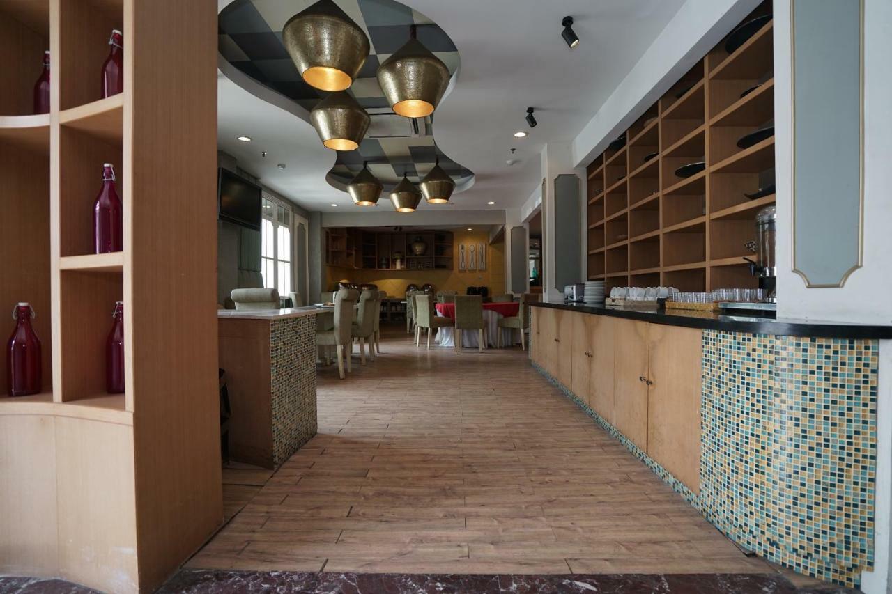 Capital O 1128 Hotel Imara ปาเลมบัง ภายนอก รูปภาพ